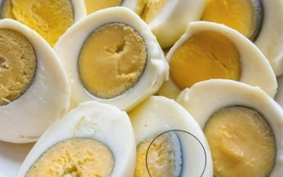 Why is the yolk of my hard-boiled egg turning green?